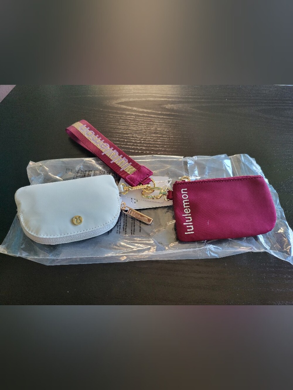 Lululemon Dual Pouch Wristlet *Wordmark
Deep Luxe / Gold / Bone